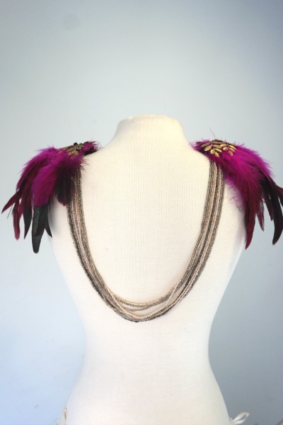 Back necklace with fuchsia shoulder pads